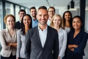 Group of coworkers standing in modern office for startup business